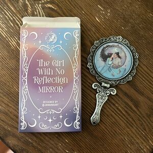 The Girl With No Reflection Hand Mirror